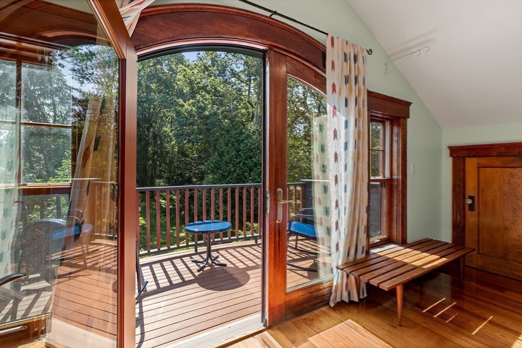 177 Highland Road Andover, MA 01810 - Photo 26 of 37 a view of balcony with two chairs and wooden floor