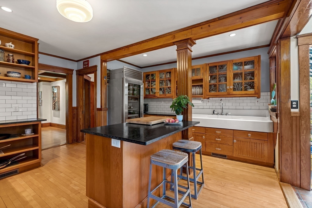 177 Highland Road Andover, MA 01810 - Photo 6 of 37 a kitchen with stainless steel appliances granite countertop a stove and a refrigerator