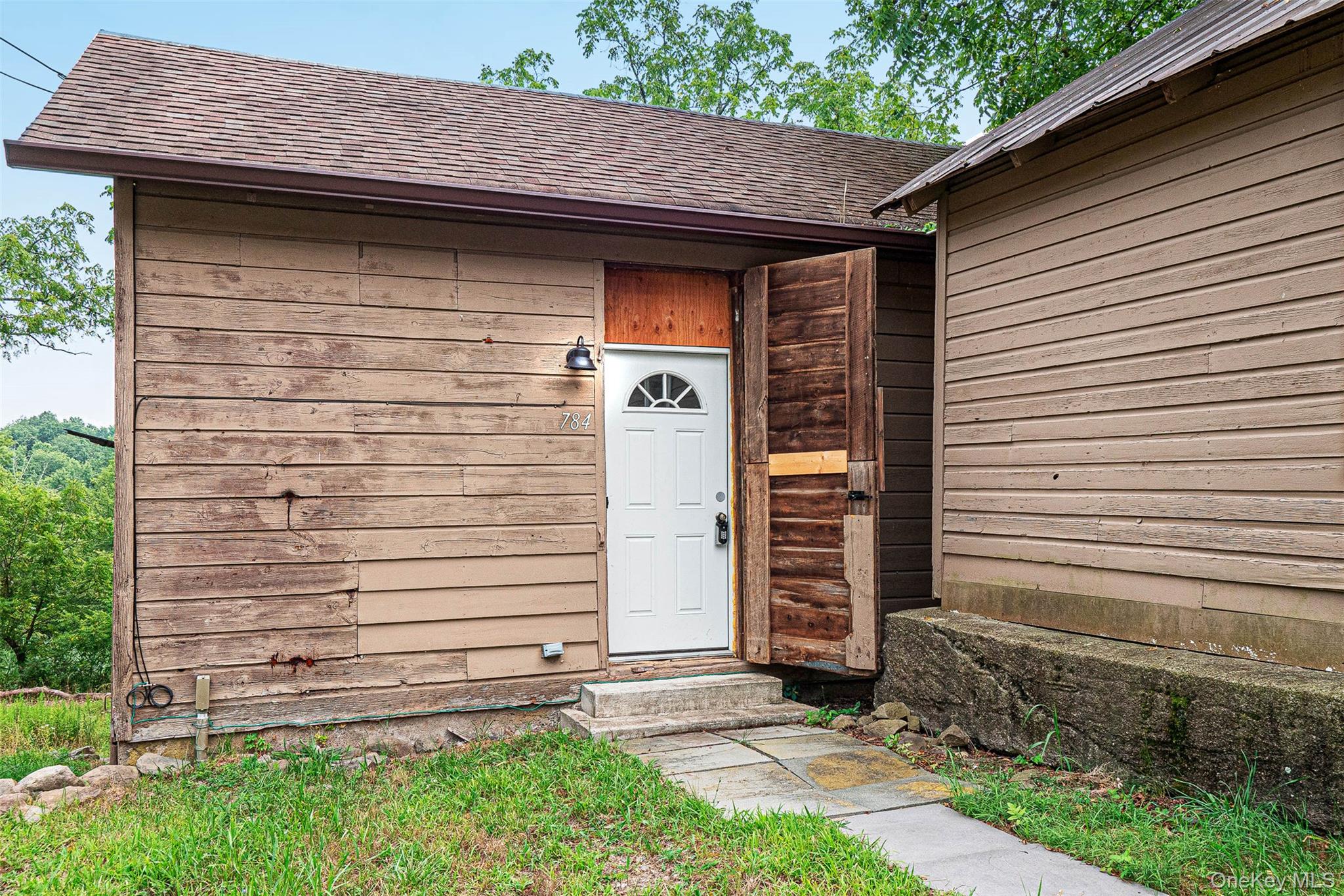 a front view of a house with garage