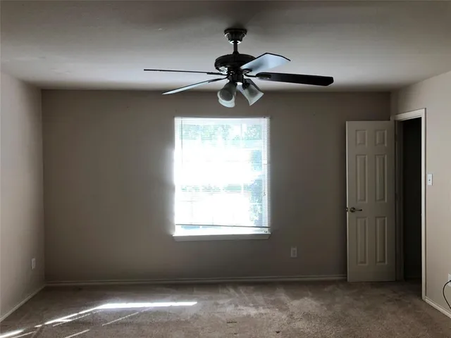 a view of a window in an empty room