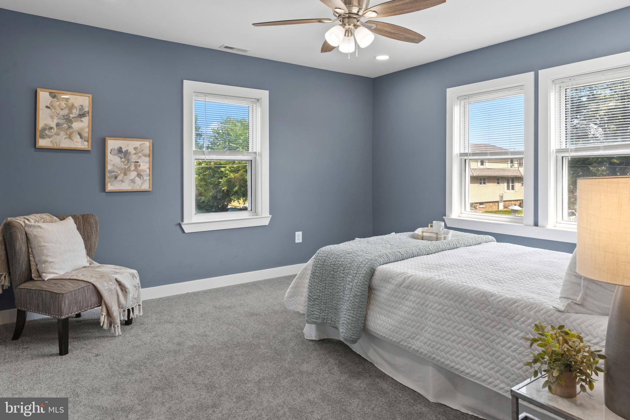5728 Clover Road Baltimore, MD 21215 - Photo 18 of 40 a bedroom with a large bed and a window