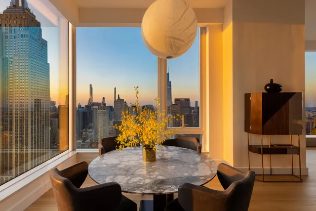 a view of a living room with furniture