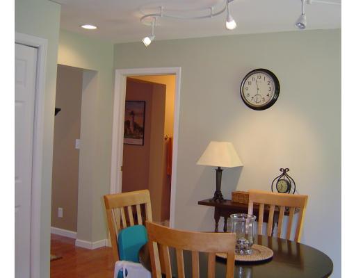 161 Rice Corner Road Brookfield, MA 01506 - Photo 12 of 28 a view of a dining room with furniture and wooden floor
