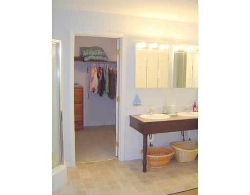 161 Rice Corner Road Brookfield, MA 01506 - Photo 20 of 28 a bathroom with a sink a toilet and mirror