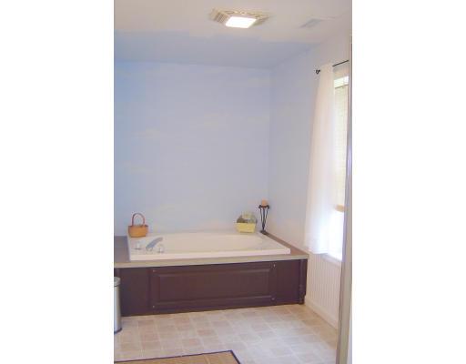 161 Rice Corner Road Brookfield, MA 01506 - Photo 21 of 28 a bathroom with a tub and sink