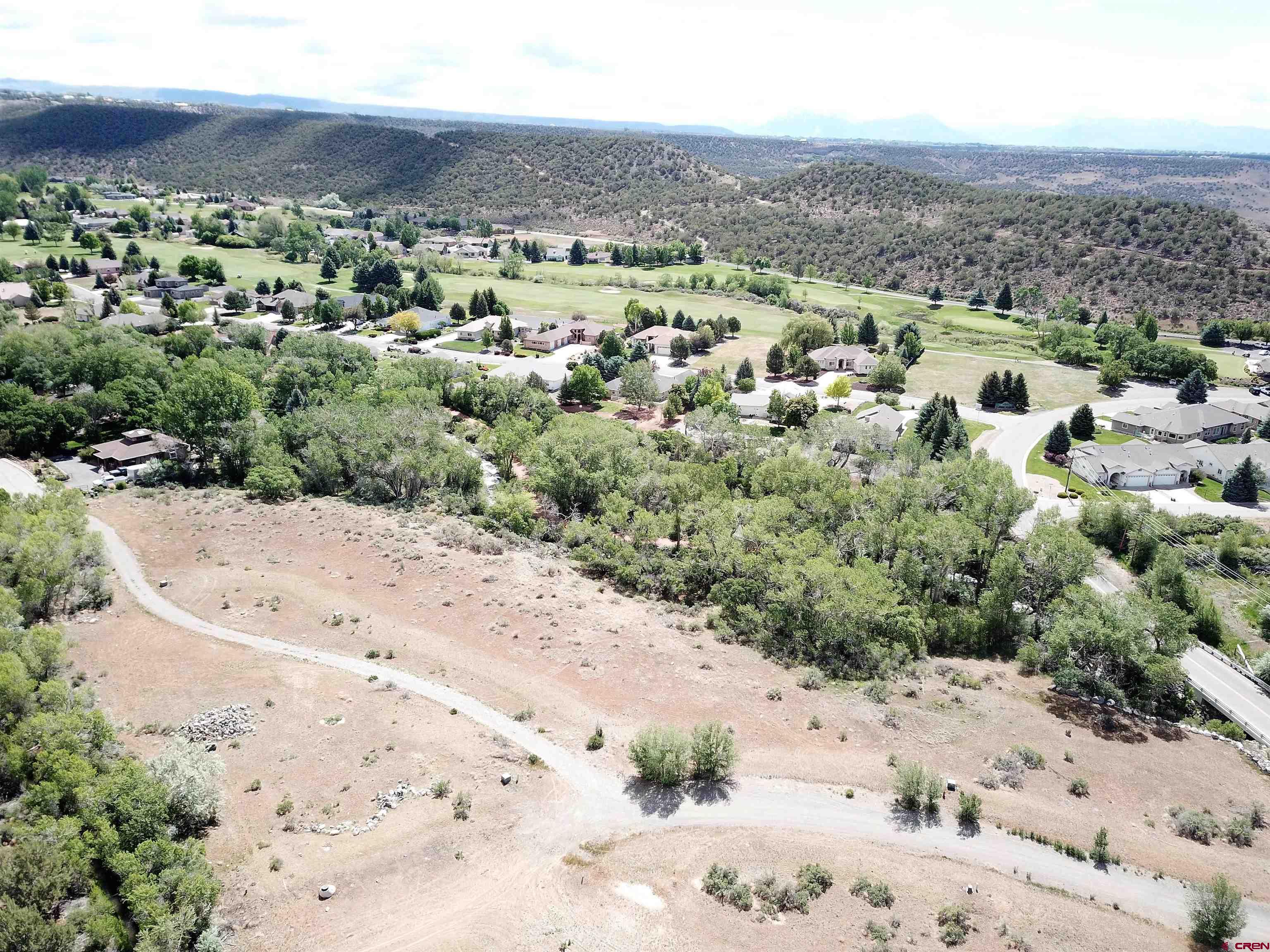 Lot 1 Southeast 3rd Will-o-way Subdivision Cedaredge, CO 81413 - Photo 8 of 11 an aerial view of a houses with beach
