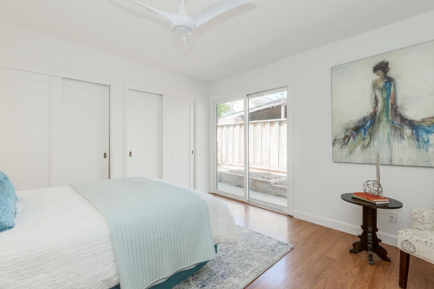 2576 Forest Avenue San Jose, CA 95050 - Photo 12 of 18 a bedroom with a bed and a window