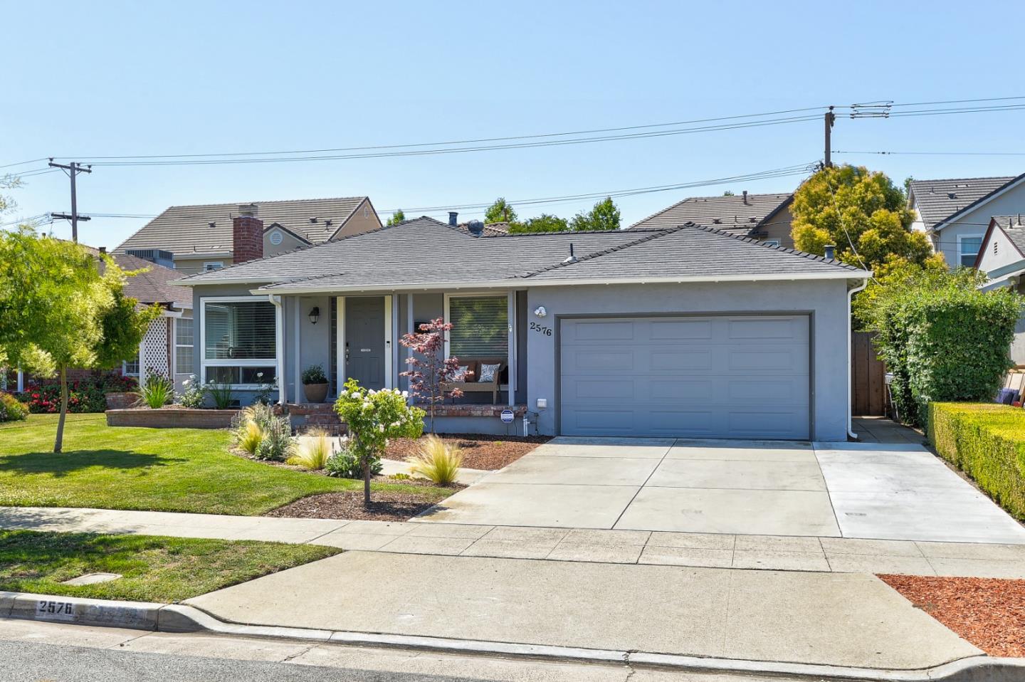 2576 Forest Avenue San Jose, CA 95050 - Photo 2 of 18 a front view of a house with garden