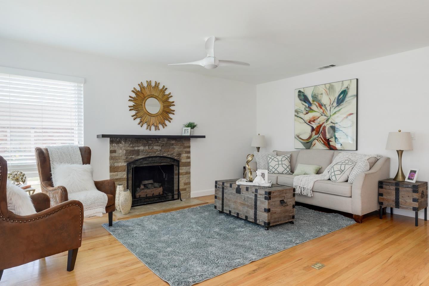 2576 Forest Avenue San Jose, CA 95050 - Photo 3 of 18 a living room with furniture and a fireplace