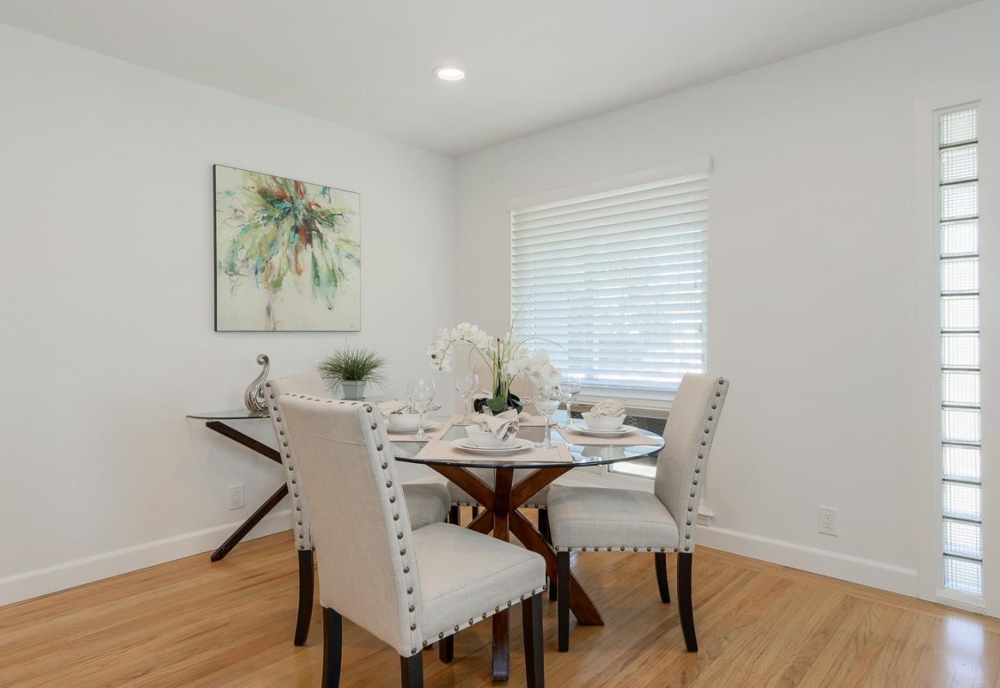 2576 Forest Avenue San Jose, CA 95050 - Photo 4 of 18 a view of a dining room with furniture and wooden floor