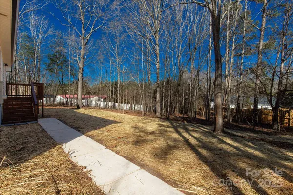 a view of balcony with wooden floor