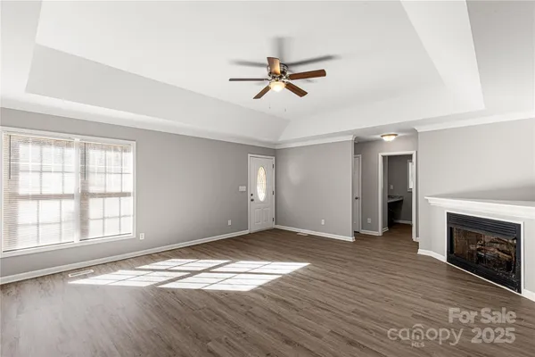 a large kitchen with a chandelier