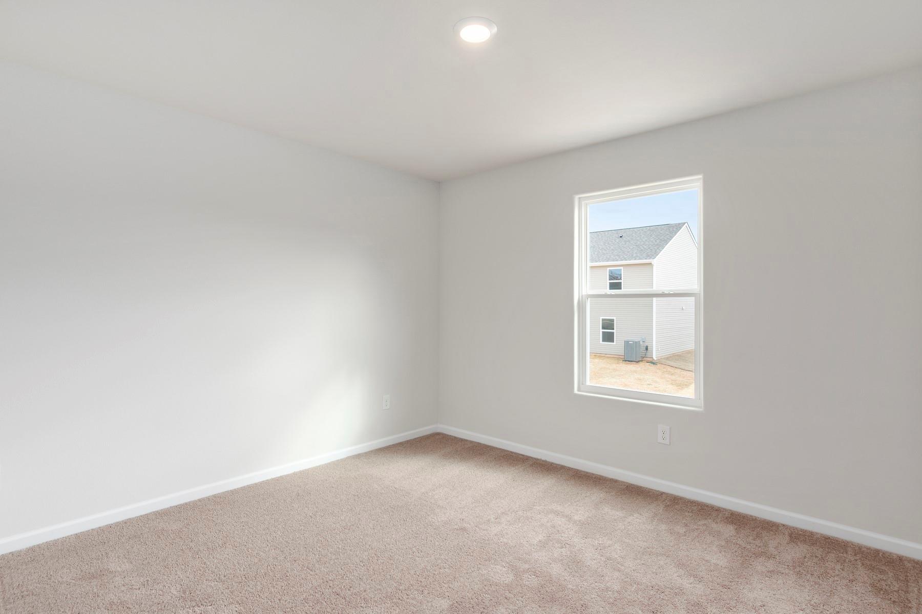 1405 Nia Road Charlotte, NC 28215 - Photo 14 of 16 an empty room with a window