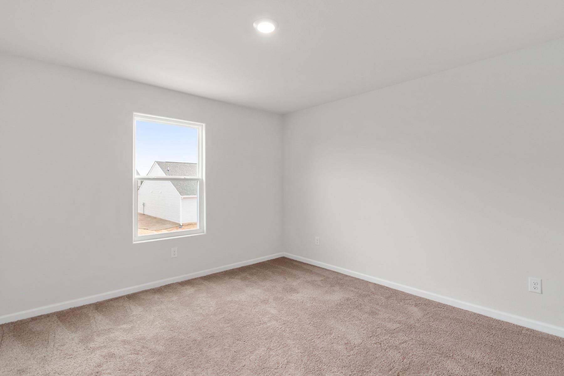 1405 Nia Road Charlotte, NC 28215 - Photo 15 of 16 an empty room with a window