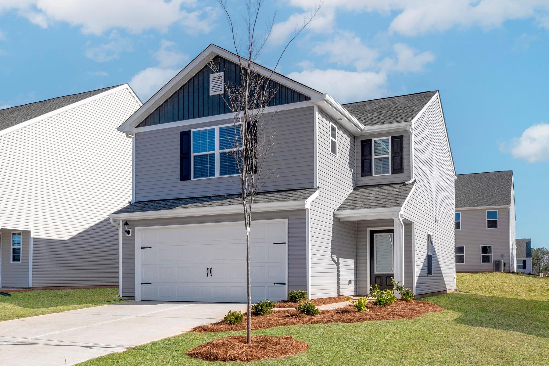 1405 Nia Road Charlotte, NC 28215 - Photo 2 of 16 a front view of a house with a yard
