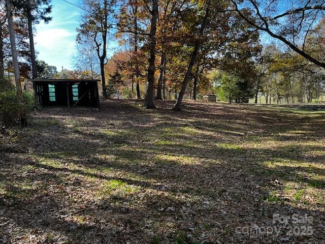 109 Lineview Drive Matthews, NC 28104 - Photo 15 of 16 a view of outdoor space with deck and tree