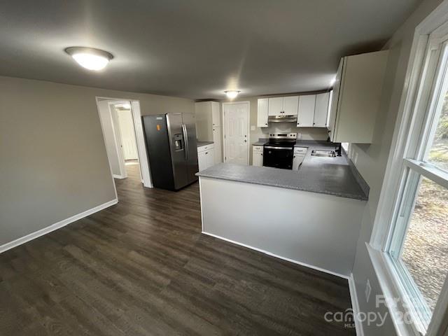 109 Lineview Drive Matthews, NC 28104 - Photo 3 of 16 a kitchen with refrigerator and car parked