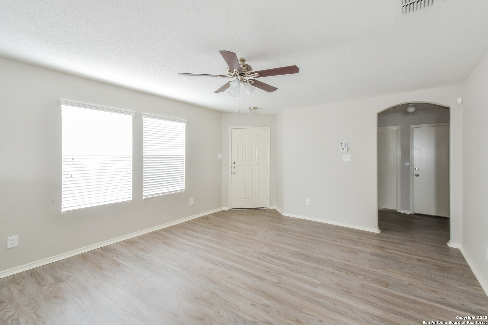 3603 Alonzo Fields Converse, TX 78109 - Photo 2 of 16 a view of an empty room with wooden floor and a window