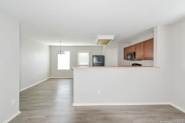 a view of a livingroom and a workspace