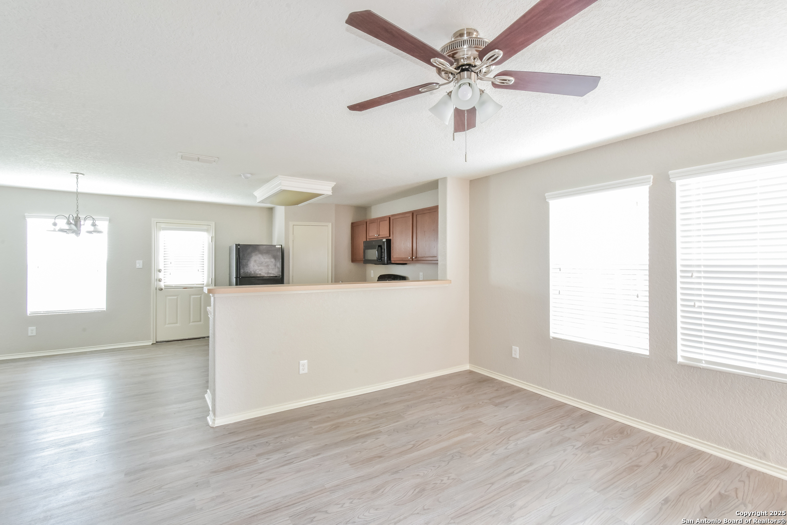 3603 Alonzo Fields Converse, TX 78109 - Photo 5 of 16 a view of a kitchen with an empty space and a window