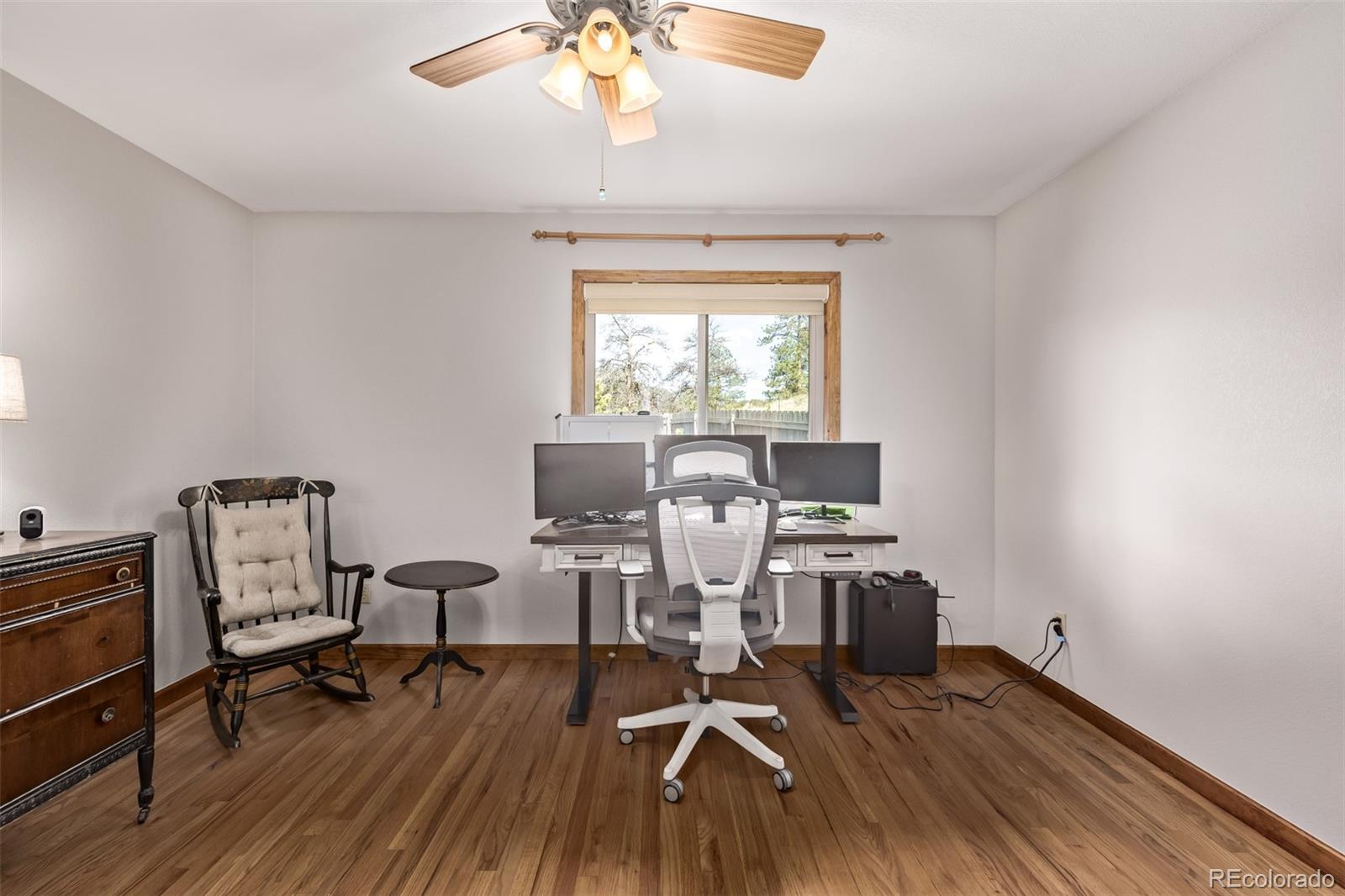 13950 Pine Valley Road Pine, CO 80470 - Photo 21 of 49 a workspace with wooden floor