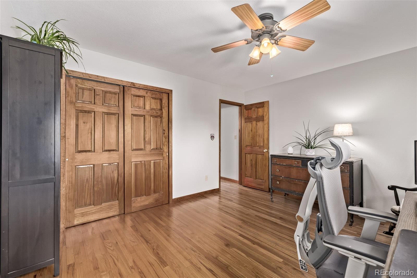 13950 Pine Valley Road Pine, CO 80470 - Photo 22 of 49 a view of entryway with wooden floor