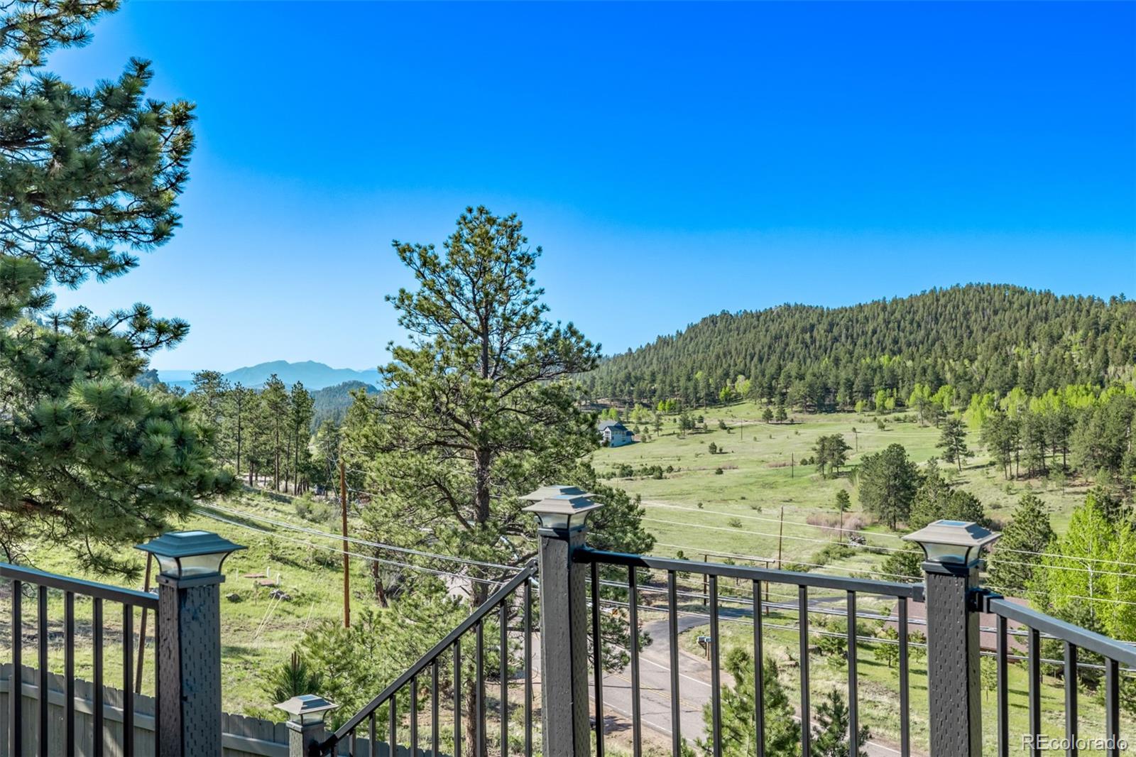 13950 Pine Valley Road Pine, CO 80470 - Photo 37 of 49 a view of a balcony with an outdoor space