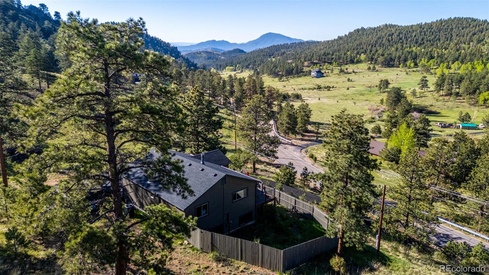 13950 Pine Valley Road Pine, CO 80470 - Photo 44 of 49 a view of a mountain with a outdoor space