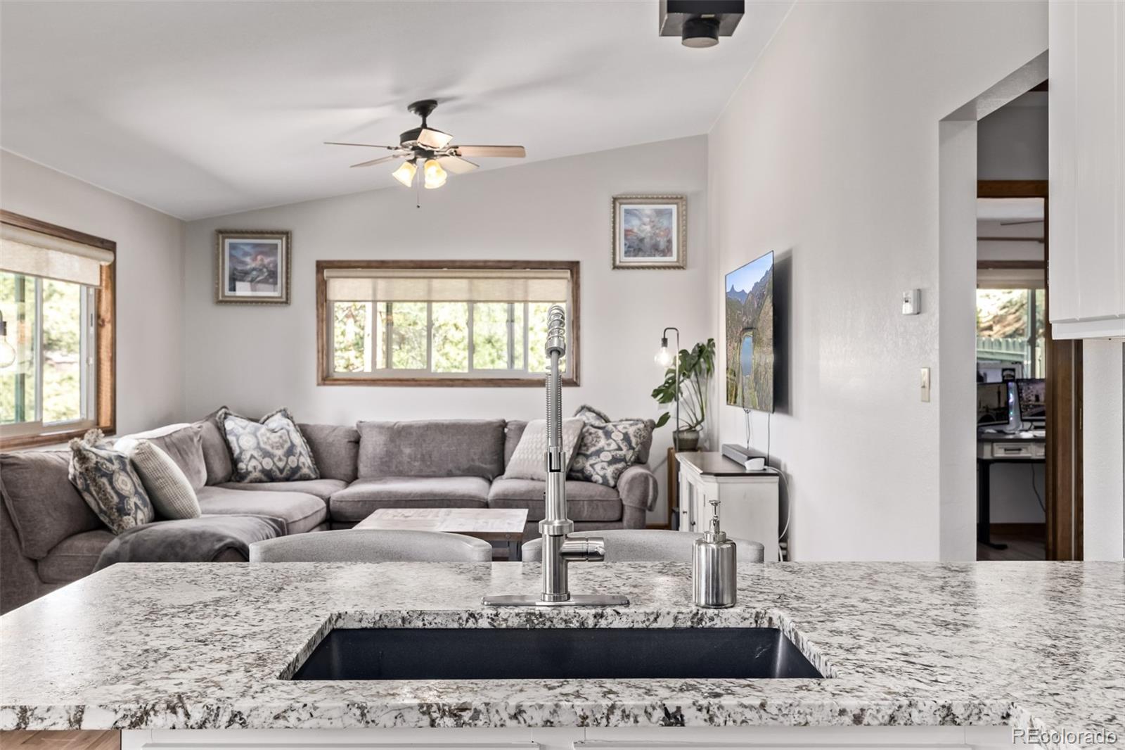 13950 Pine Valley Road Pine, CO 80470 - Photo 10 of 49 a living room with furniture and a large window