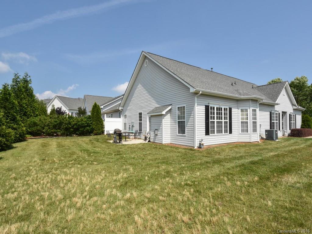 207 Garnet Court, Unit 561 Fort Mill, SC 29708 - Photo 15 of 21 a front view of a house with a yard