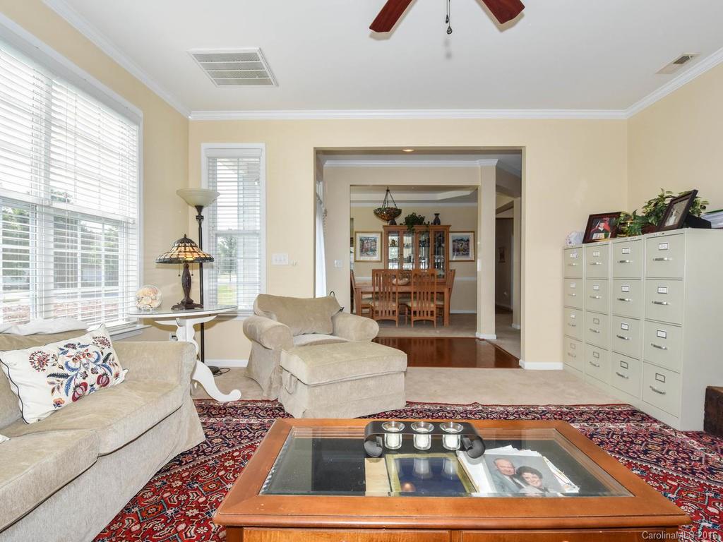 207 Garnet Court, Unit 561 Fort Mill, SC 29708 - Photo 7 of 21 a living room with furniture and a rug