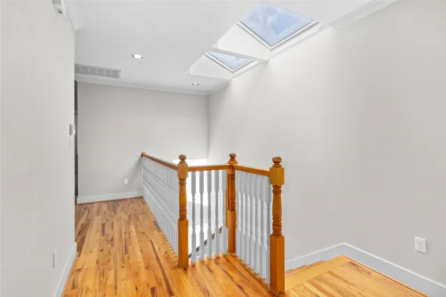 a view of entryway with wooden floor