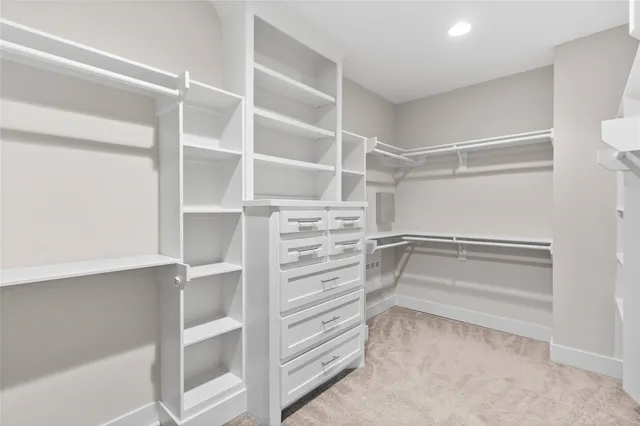 a view of an empty walk in closet