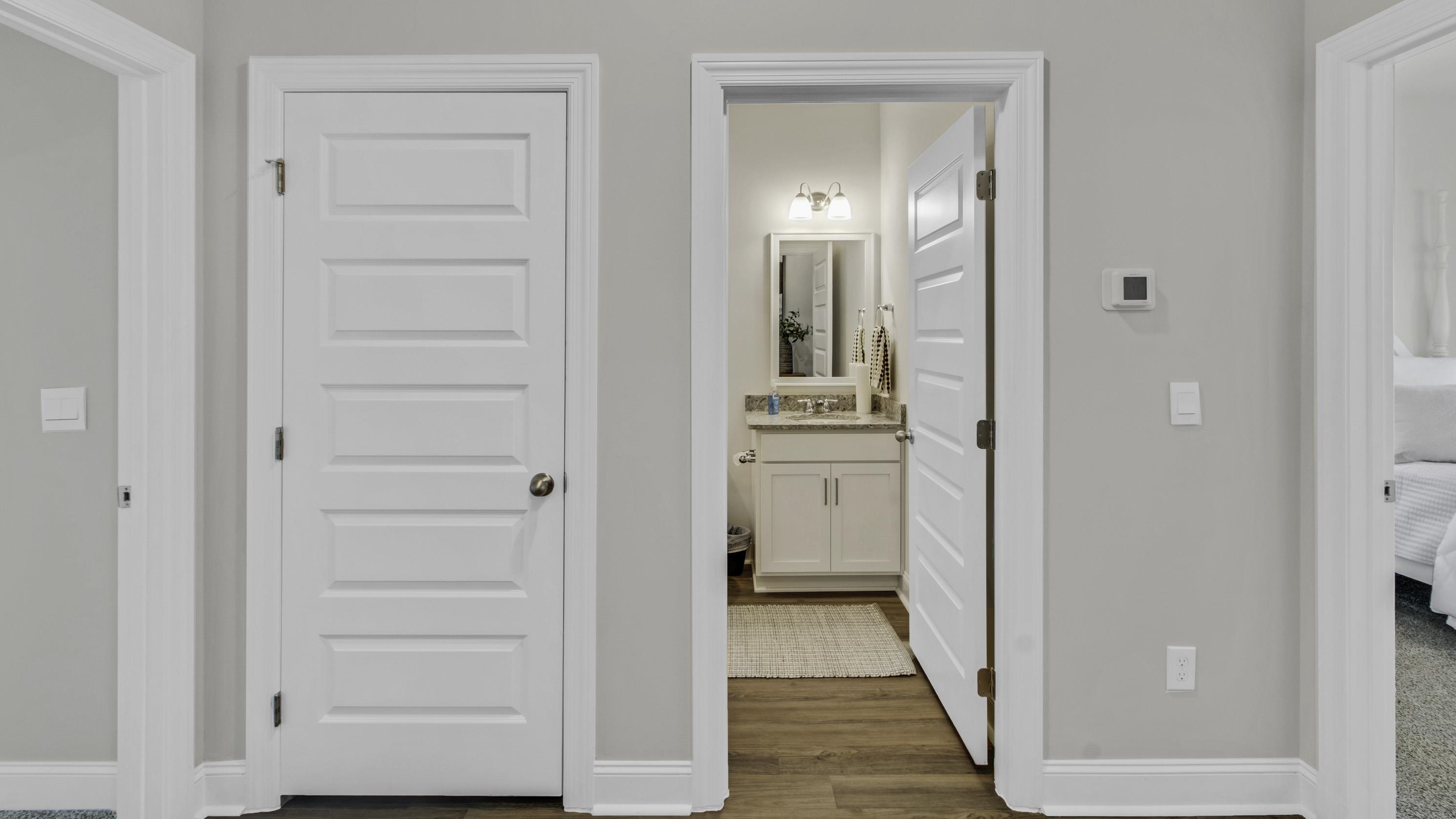990 Mewborn Farm Road Oakland, TN 38060 - Photo 23 of 40 Hallway featuring baseboards and dark wood-type flooring