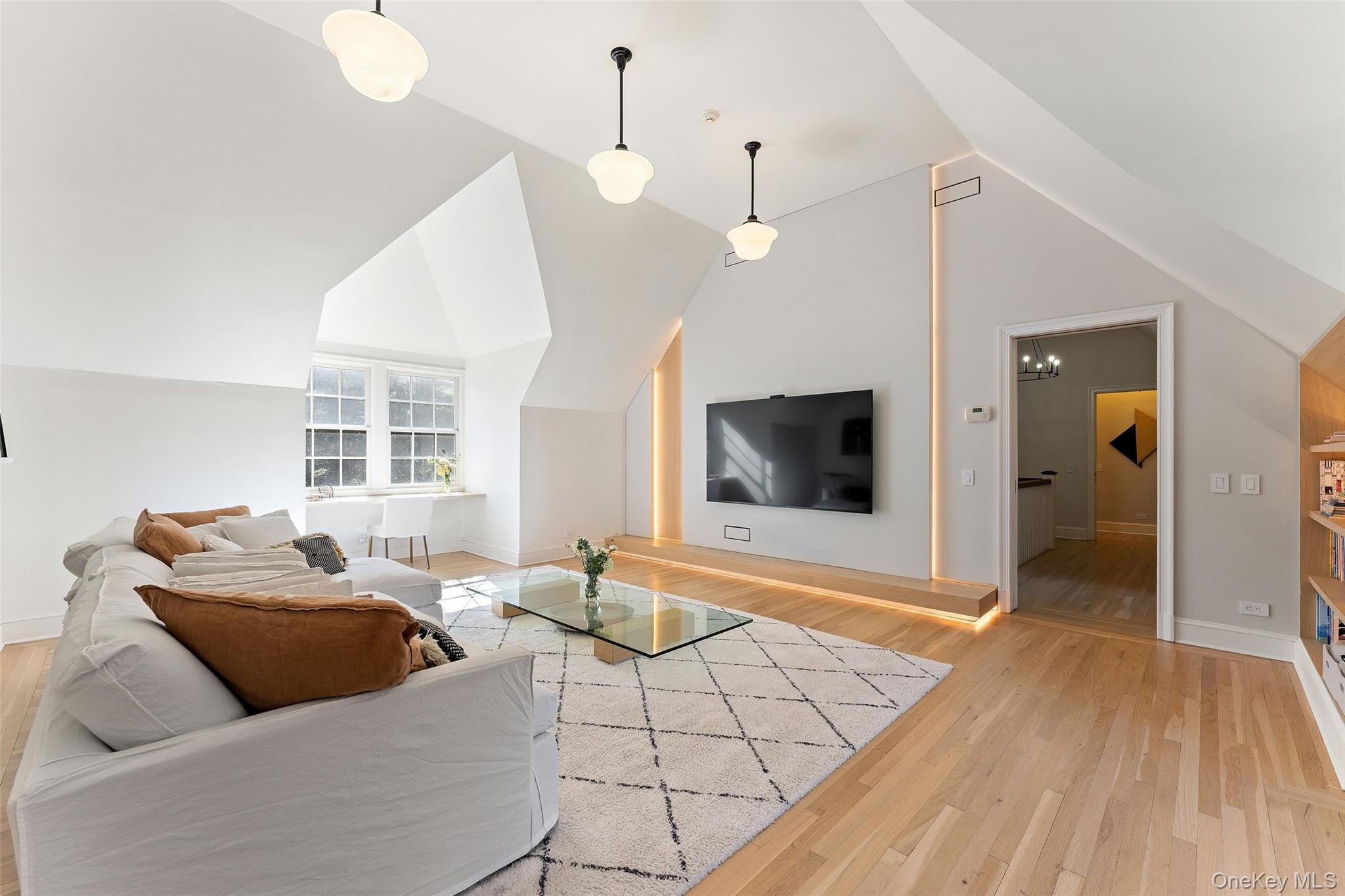 50 Greendale Road Scarsdale, NY 10583 - Photo 20 of 34 a living room with furniture and a flat screen tv