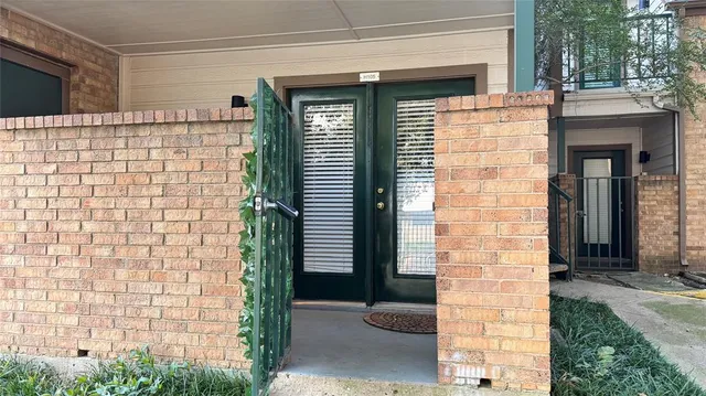 a front view of a house with a garage