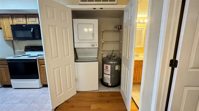 a view of a kitchen from the hallway