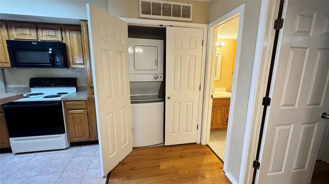 a view of kitchen and utility room