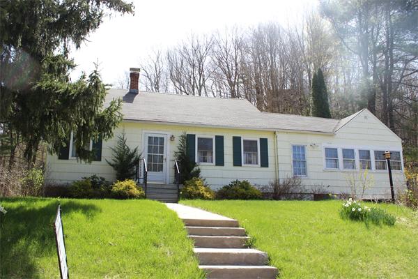 118 Washington Road Brimfield, MA 01010 - Photo 17 of 20 a front view of a house with a yard and porch