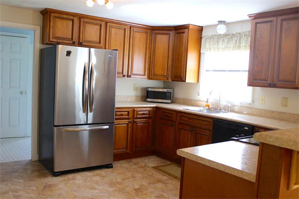 118 Washington Road Brimfield, MA 01010 - Photo 8 of 20 a kitchen with stainless steel appliances granite countertop a refrigerator sink and cabinets