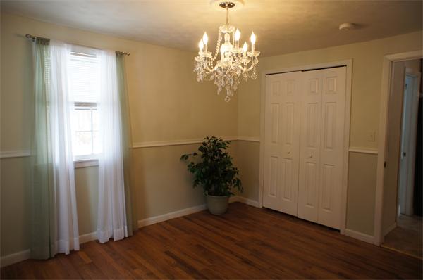 118 Washington Road Brimfield, MA 01010 - Photo 9 of 20 wooden floor in an empty room with a window