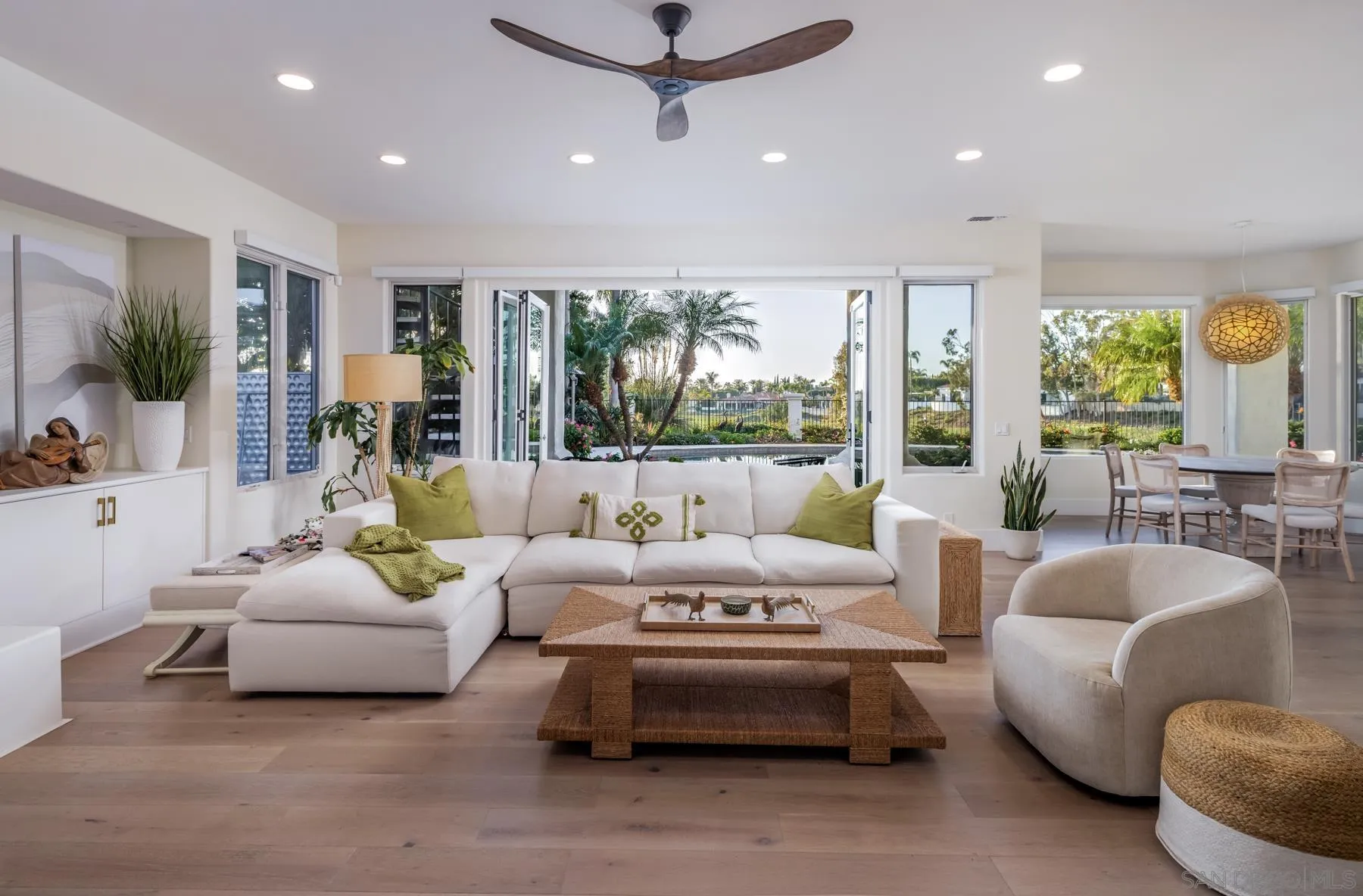 7430 St Andrews Road Rancho Santa Fe, CA 92067 - Photo 11 of 48 a living room with furniture and a flat screen tv