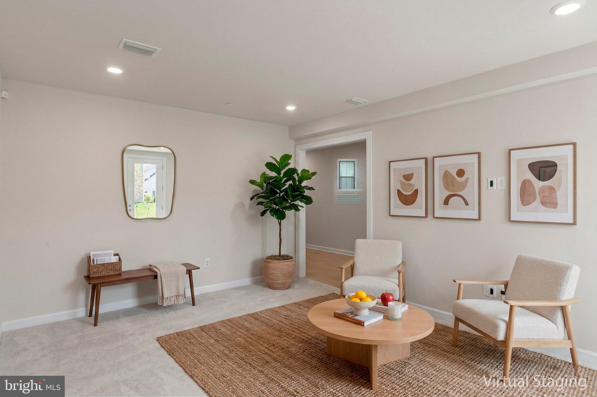 7504 Overview Terrace Columbia, MD 21044 - Photo 14 of 54 a living room with furniture and a potted plant