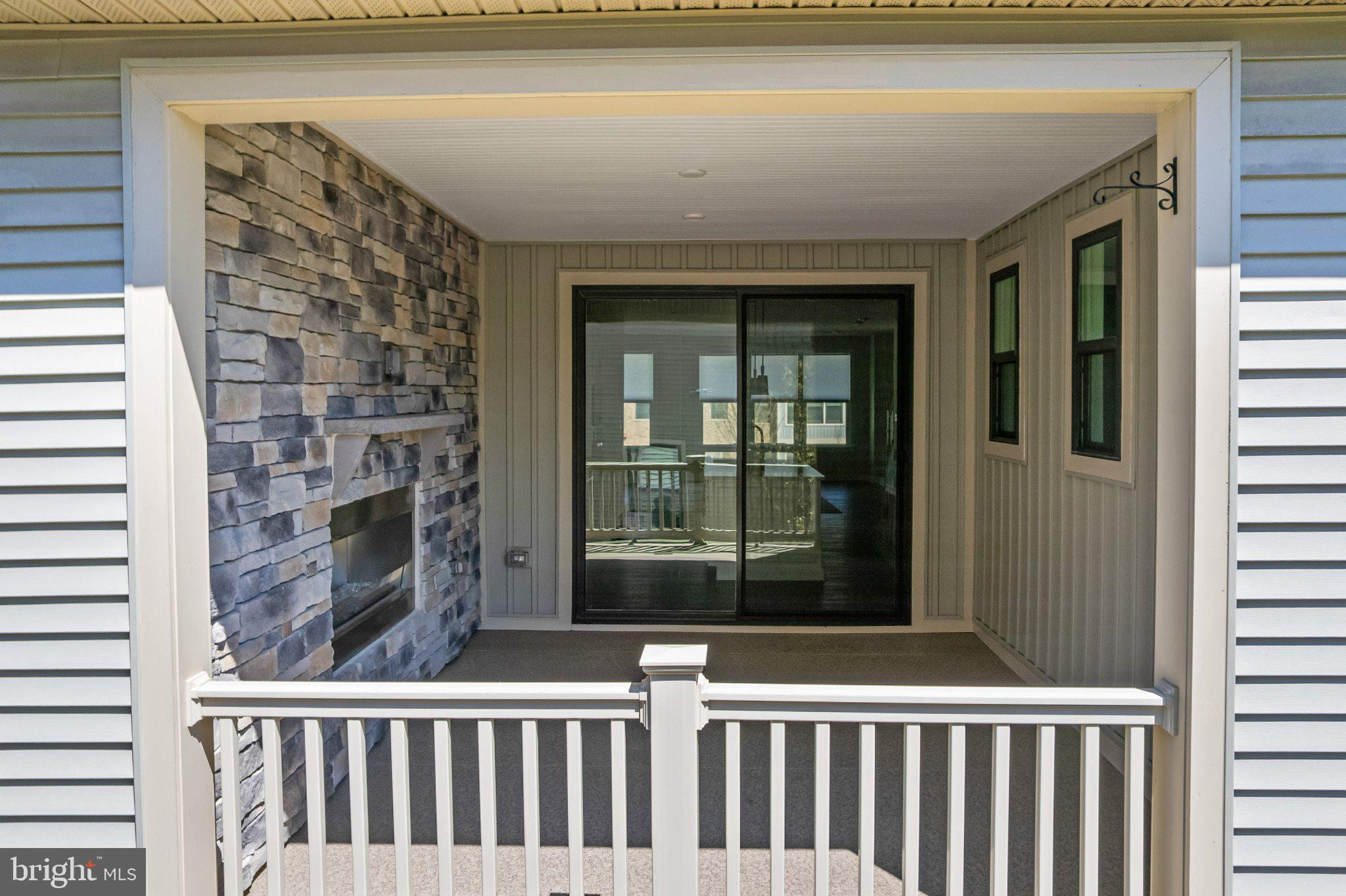 7504 Overview Terrace Columbia, MD 21044 - Photo 25 of 54 Charming outdoor retreat with stone accents.
