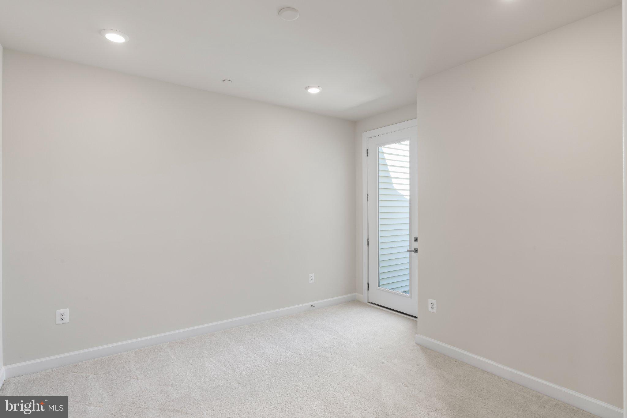 7504 Overview Terrace Columbia, MD 21044 - Photo 32 of 54 an empty room with windows and closet