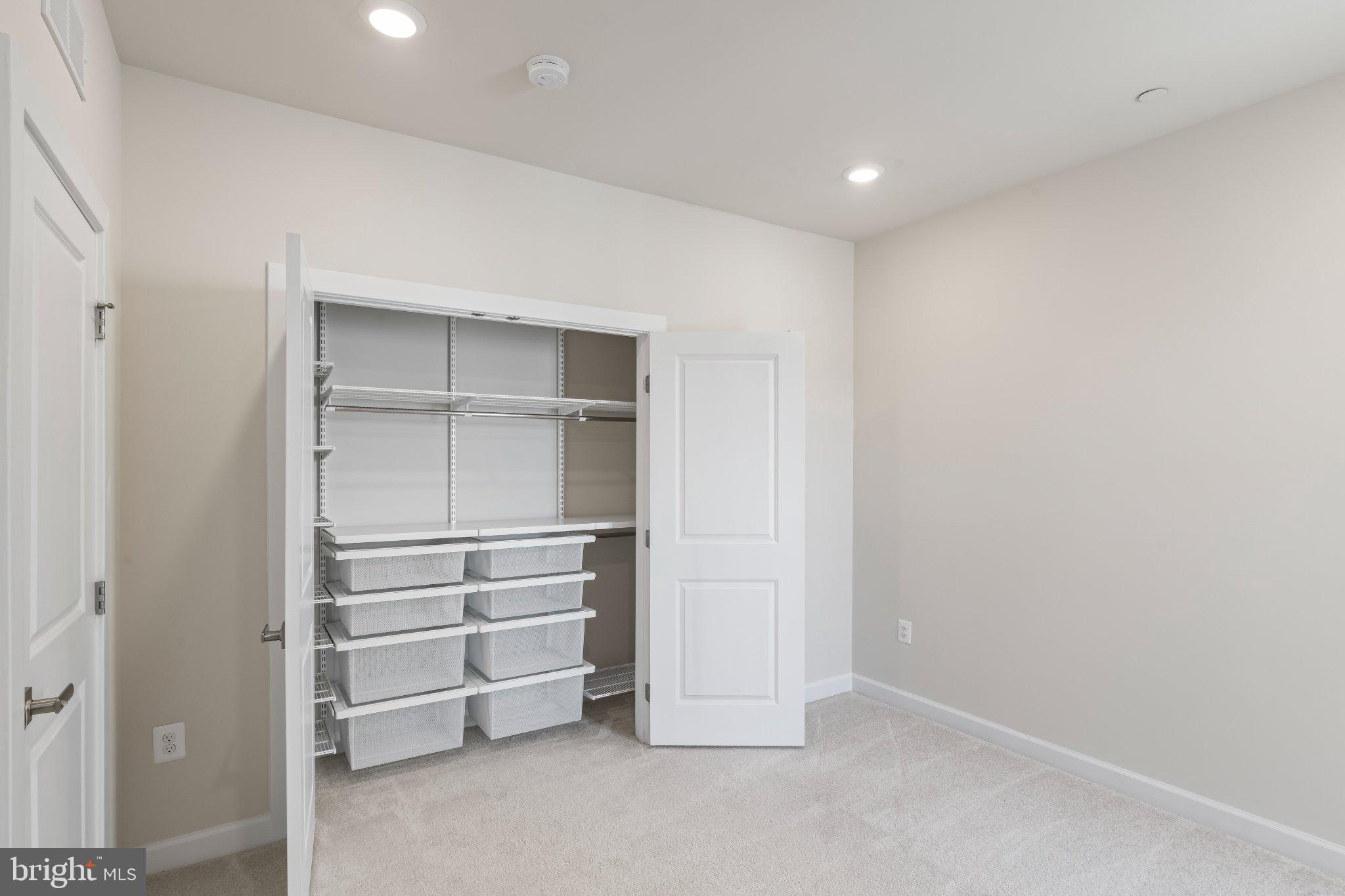7504 Overview Terrace Columbia, MD 21044 - Photo 33 of 54 a view of an empty walk in closet