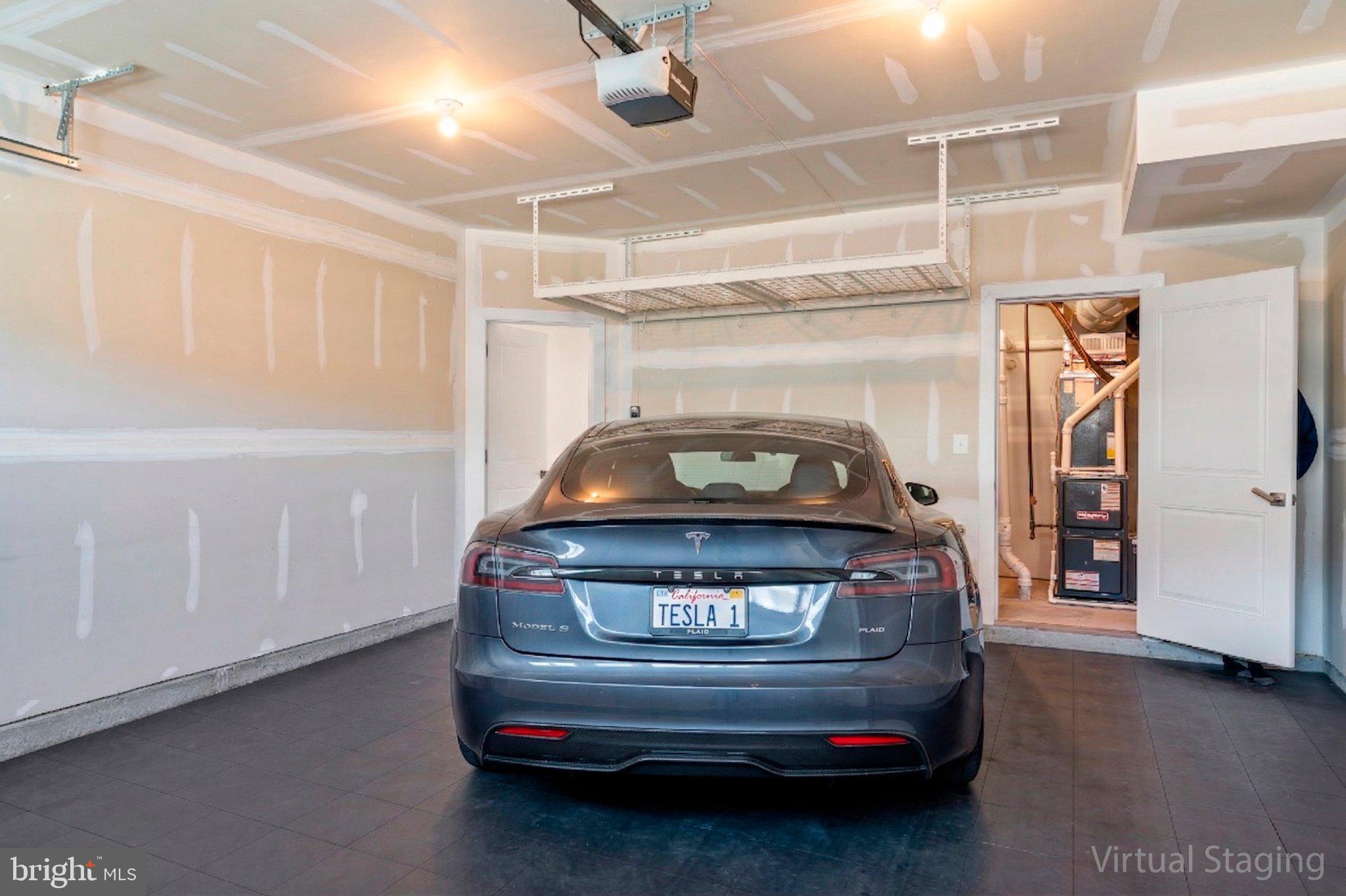 7504 Overview Terrace Columbia, MD 21044 - Photo 42 of 54 a view of car parked in garage