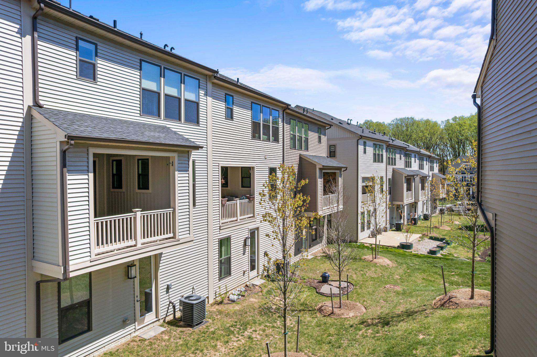 7504 Overview Terrace Columbia, MD 21044 - Photo 49 of 54 a front view of a house with a yard