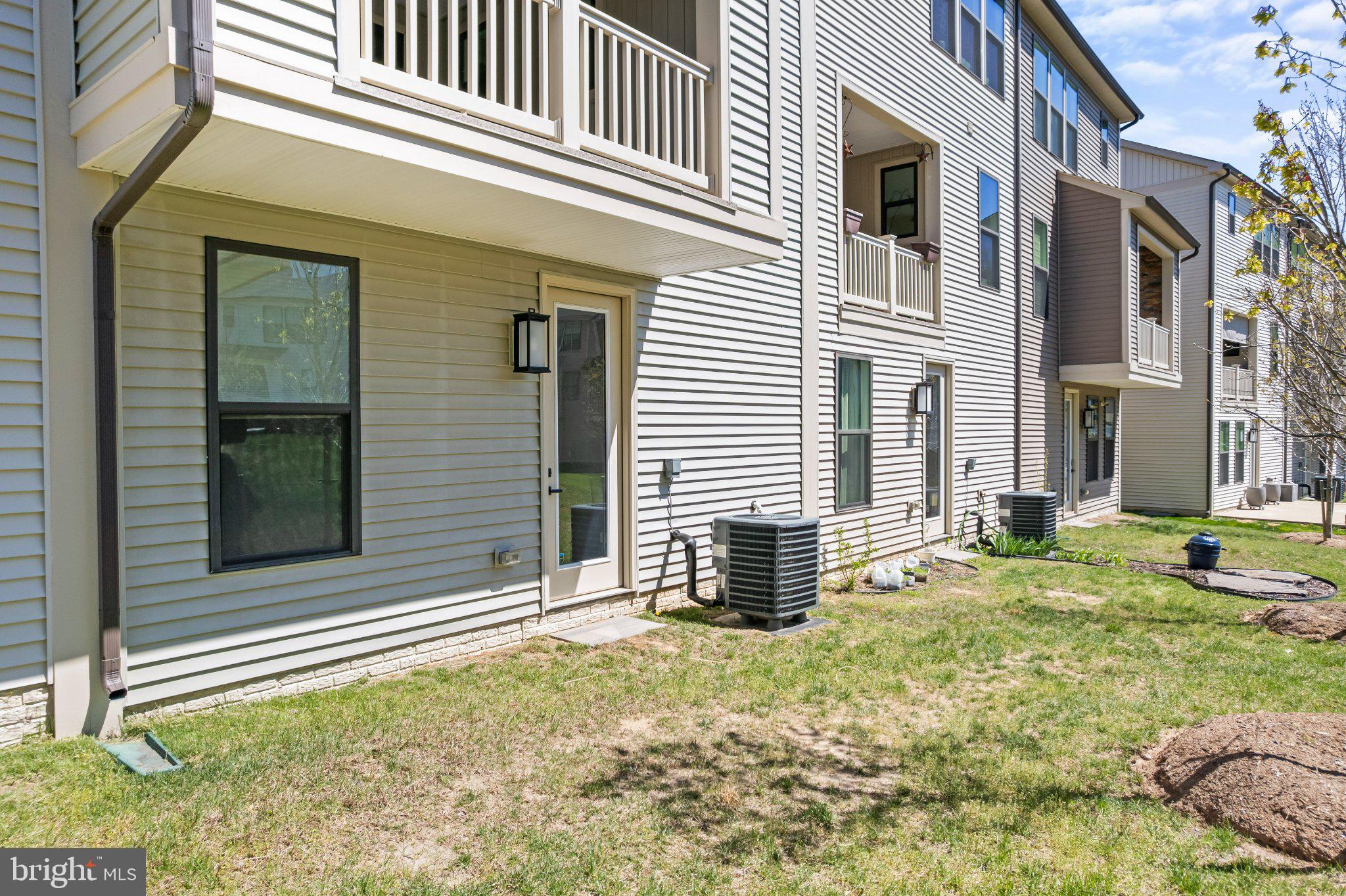 7504 Overview Terrace Columbia, MD 21044 - Photo 50 of 54 a view of a house with a yard and sitting area