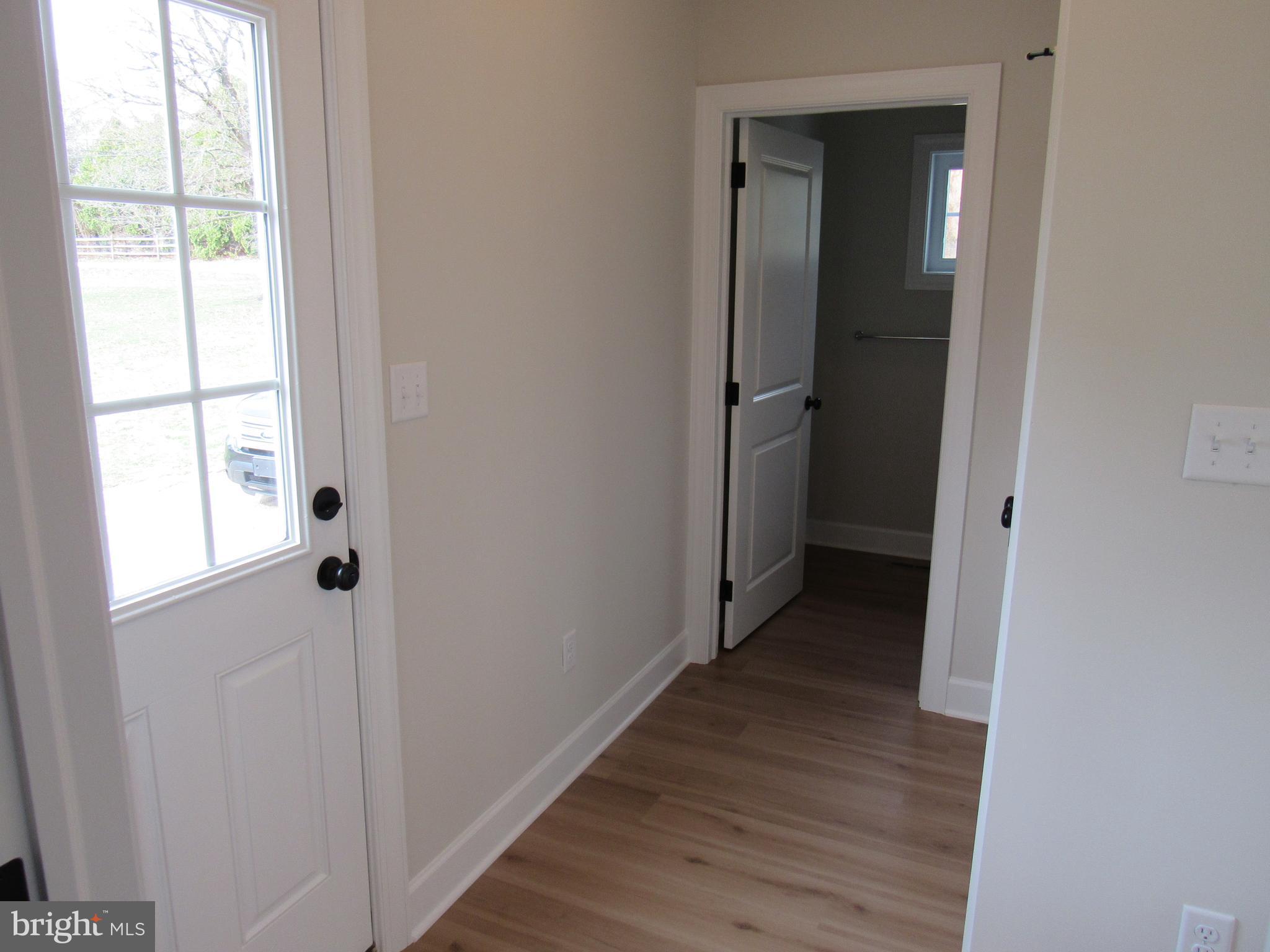 957 Spring City Road Phoenixville, PA 19460 - Photo 26 of 57 side entry coat closet and powder rm and pantry